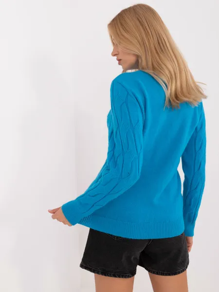 Women's blue cable knit sweater