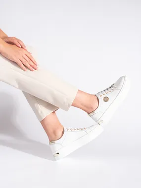 White leather sneakers with a thick sole