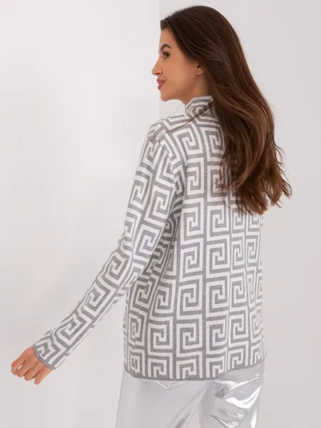 Gray and white women's turtleneck sweater with patterns.