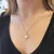Silver jewelry set with zircons and real pearls 29052.1B (earrings, chain, pendant)