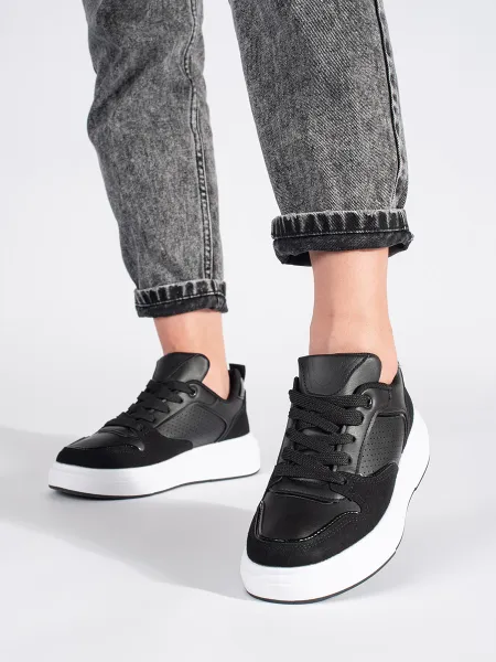 Women's black sneakers with a thick sole