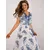Women's white and navy blue dress with a print