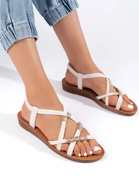 White slip-on sandals with interwoven straps