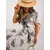 Women's white and black dress with a print