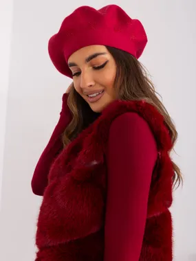 Burgundy knit beret.