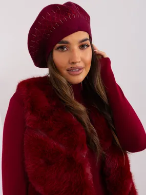 Women's burgundy beret.