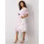 White dress with floral patterns.