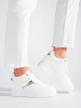 White sneakers with hidden wedge