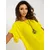 Yellow summer oversize blouse with a round neckline.