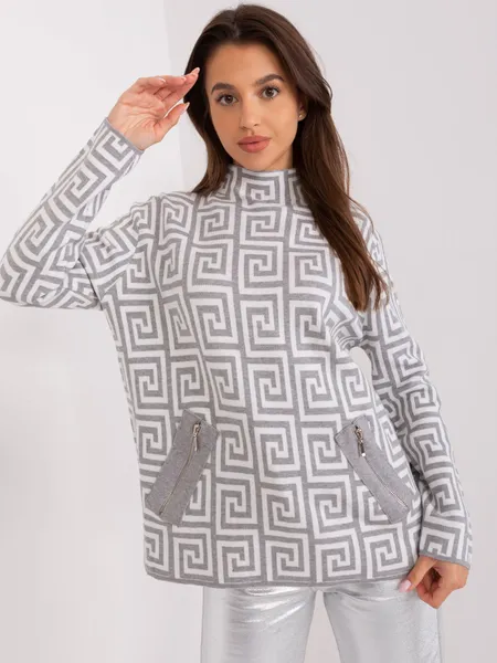 Gray and white women's turtleneck sweater with patterns.