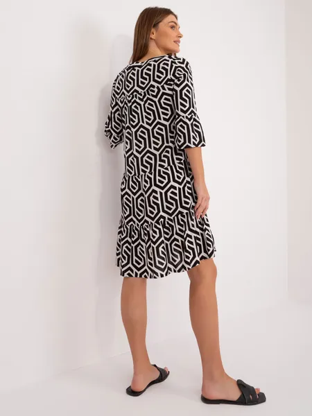 Women's black and white dress with a print