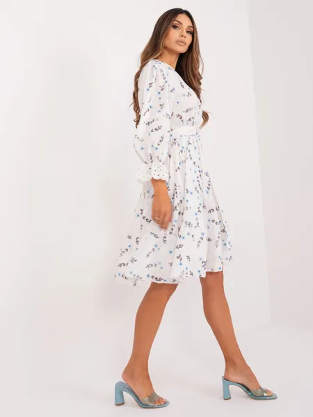 Women's white and blue dress with ruffles