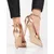 Women's Shelovet golden heels fastened around the ankle