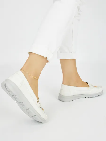 White comfortable moccasins made of eco-leather