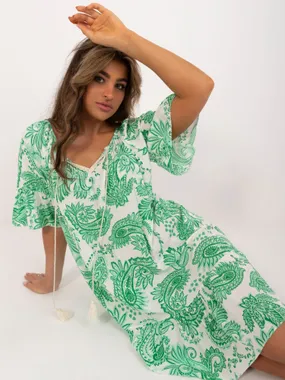 Women's white and green dress with ruffles