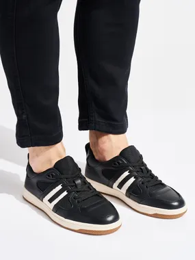 Black sports shoes made of eco-leather